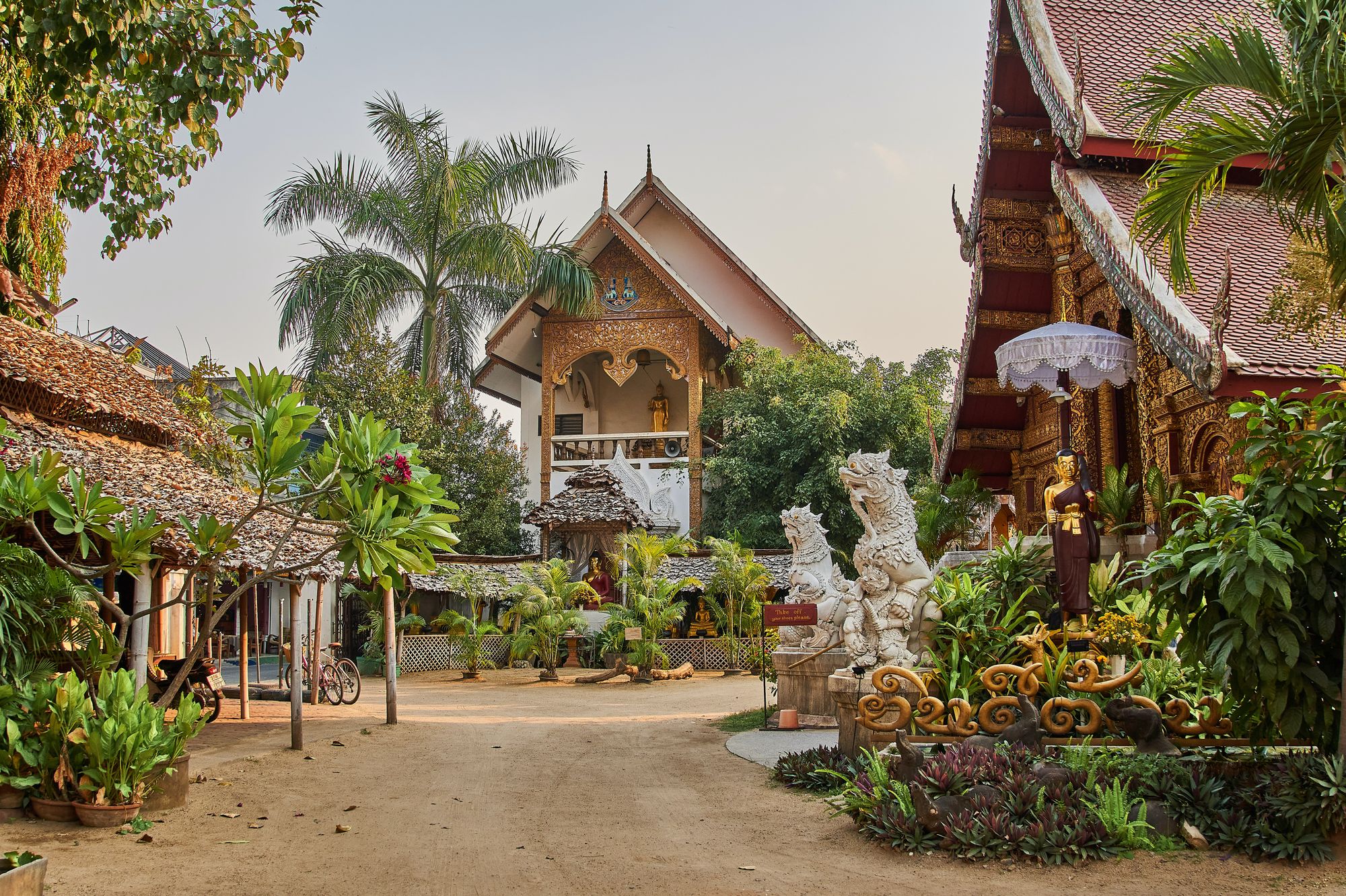 Temple and village road in Chiang Mai, Thailand