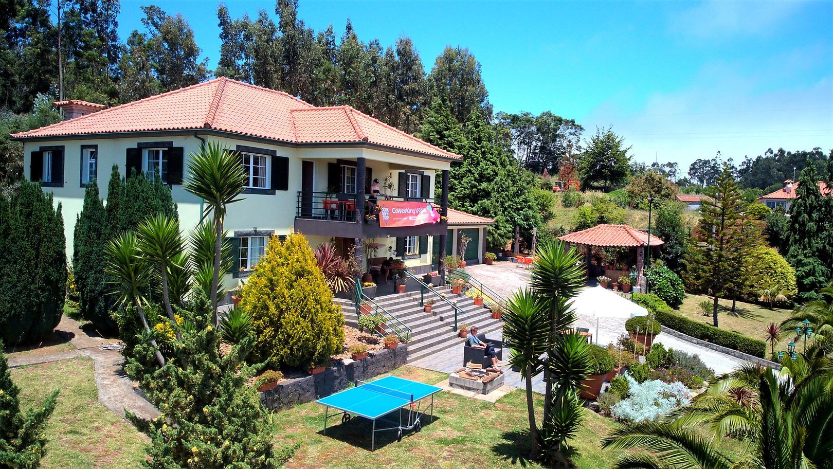 HomeOffice Madeira residential style palatial villa with lawn, stairs, main building and outdoor gazebo